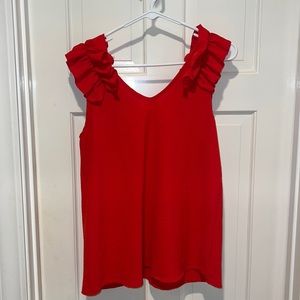 Very cute blouse with rifle sleeves. Size small